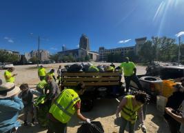 A photo of a group of volunteers picking up litter 