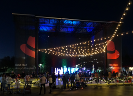a photo of the rink at red hat amphitheater at night